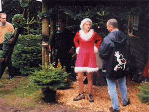 Weihnachtsfrau in unserem Weihnachtwald, Weihnachtsfeier, Firmenfeier, Weihnachtsfeier, Firmenweihnachtfeier, Weihnachtsbaumwald, mit Weihnachtsbaumschlagen, 